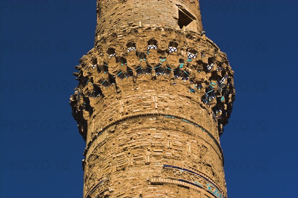 AFGHANISTAN, Herat, "The Mousallah Complex, Minaret One of several minarets in this complex, this one stands by Gaur Shad 's Mausoleum with a mortar hole in it, ,another one also near the mausoleum is partly destroyed and four stand marking the corners of the long gone Madrassa built by Sultan Husain Baiquara last of the Timurid rulers Six other minarets were demolished by British troops in 1885, and 3 were destroyed by earthquakes Jane Sweeney"