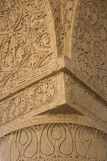 AFGHANISTAN, (Mother of Cities), Balkh, "No-Gonbad Mosque (Mosque of Nine Cupolas) also known as Khoja Piada or Masjid-e Haji Piyada (Mosque of the Walking Pilgrim), Carved stucco decoration on column Dates to the early 9th Century A.D. Earliest Islamic monument identified in Afghanistan, has influences from the Achaemenid, Graeco-Bactrain and Kushano-Sasanian periods, few dateable examples of mosque architecture exist anywhere in the world form this early periodes)  Jane Sweeney"