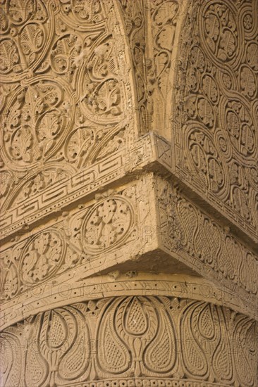 AFGHANISTAN, (Mother of Cities), Balkh, "No-Gonbad Mosque (Mosque of Nine Cupolas) also known as Khoja Piada or Masjid-e Haji Piyada (Mosque of the Walking Pilgrim), Carved stucco decoration on column Dates to the early 9th Century A.D. Earliest Islamic monument identified in Afghanistan, has influences from the Achaemenid, Graeco-Bactrain and Kushano-Sasanian periods, few dateable examples of mosque architecture exist anywhere in the world form this early periodes) Jane Sweeney"