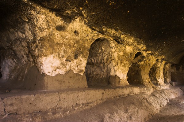 AFGHANISTAN, Samangan Province, Takht-I-Rusam, "2km south of the centre of Haibak, Buddhist caves know as Takht-I-Rusam (Rustam's throne), part of a stupa-monastery complex caeved from rock dating from the Kushano-Sasanian period 4th-5th century AD. Corridor off which the monks' living quarters are carved in cave 2 The caves are situated below the stupa and are where monks lived"