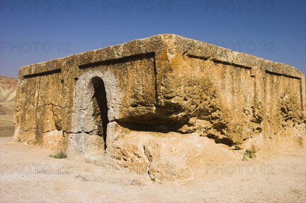 AFGHANISTAN, Samangan Province, Takht-I-Rusam, "2km south of the centre of Haibak, Buddhist stupa carved out of rock known as Top-I-Rustam (Rustam's throne) an early burial mound that contained relics of the Buddha, part of a stupa-monastery complex carved from rock dating from the Kushano-Sasanian period 4th-5th century AD.