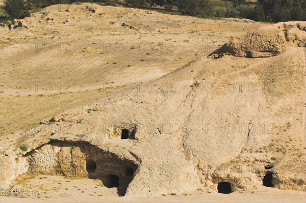 AFGHANISTAN, Samangan Province, Takht-I-Rusam, "2km south of the centre of Haibak, Buddhist caves know as Takht-I-Rusam (Rustam's throne), part of a stupa-monastery complex caeved from rock dating from the Kushano-Sasanian period 4th-5th century AD.