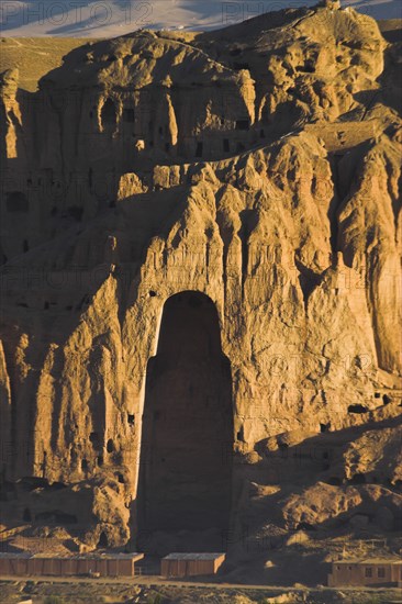 AFGHANISTAN, Bamiyan Province, Bamiyan, View of Bamiyan valley showing cliffs with empty niche where the famous carved Budda once stood (destroyed by the Taliban in 2001)