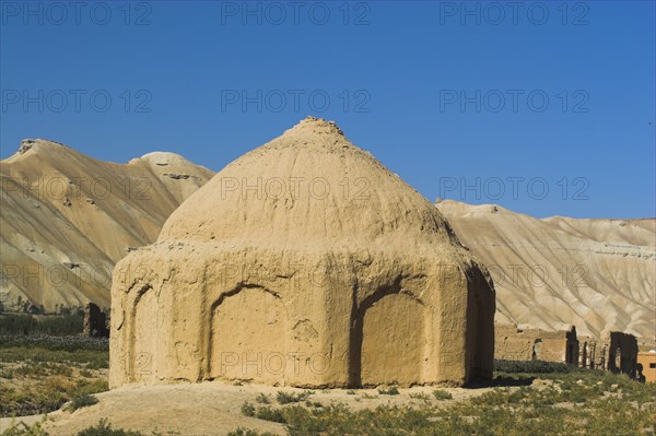 AFGHANISTAN, Bamiyan Province, Bamiyan, Tomb near empty niche where the famous carved Budda once stood (destroyed by the Taliban in 2001)