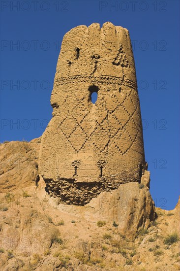 AFGHANISTAN, Bamiyan Province, Bamiyan, "Kakrak valley, watchtower at ruins which were once the site of a 21ft standing Buddha in a niche, discovered in 1030 and surrounded by caves whose Buddhists paintings thought to date from the 9th and 9th Centuries AD but removed by French archaeologists and put in the National musuem in Kabul"