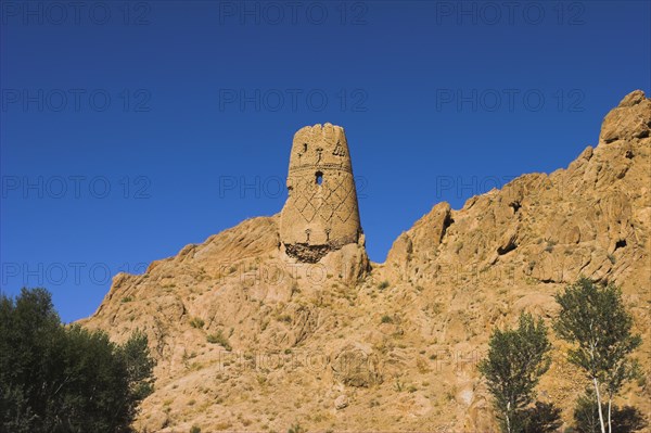AFGHANISTAN, Bamiyan Province, Bamiyan, "Kakrak valley, watchtower at ruins which were once the site of a 21ft standing Buddha in a niche, discovered in 1030 and surrounded by caves whose Buddhists paintings thought to date from the 9th and 9th Centuries AD but removed by French archaeologists and put in the National musuem in Kabul "