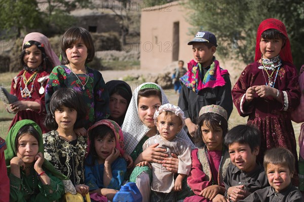 AFGHANISTAN, Ghor Province, Pal-Kotal-i-Guk, "Aimaq nomad camp, Aimaq lady with children