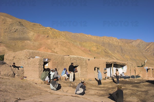 AFGHANISTAN, Ghor Province, Pal-Kotal-i-Guk, Tourists and locals outside Chaikhana(tea house)