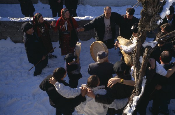 GREECE, North, Volakas, Traditional village wedding.  Dancing at the house of the bride before the ceremony.