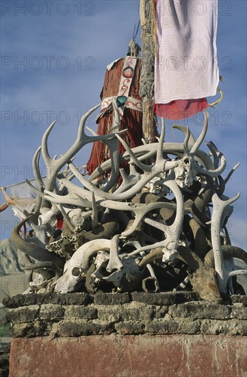 NEPAL, Mustang, Lo Manthang, Shrine of goat skulls and antlers protecting the palace of the king from demons and evil spirits.