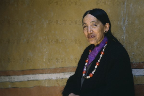 NEPAL, Mustang, People, Portrait of the Queen of Mustang from Tibetan noble lineage.