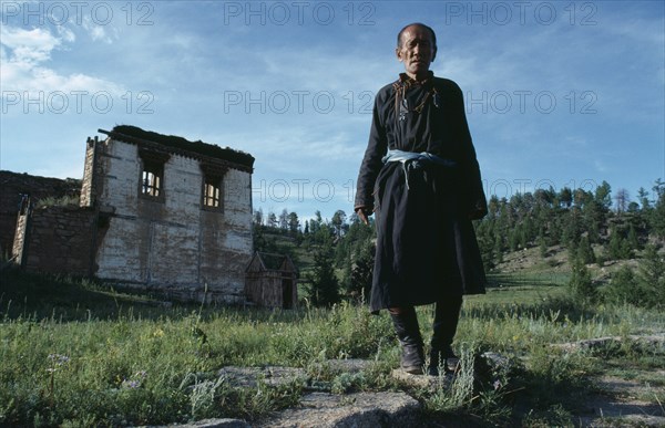 MONGOLIA, Kentii Province, Baldan Baraivan, Portrait of gatekeeper at ruined monastery complex undergoing restoration since the collapse of communism and restoration of religious freedom.