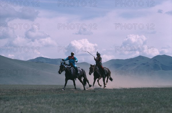 MONGOLIA, Animals, Child jockeys competing in National Day horse race.