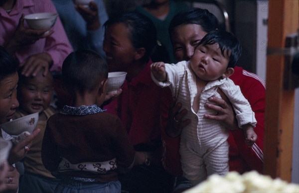 MONGOLIA, Festival, Family attending naming ceremony.