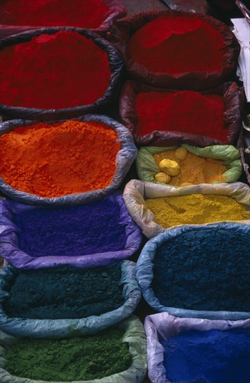 NEPAL, Patan, Brightly coloured dyes for sale in market.