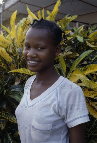 NIGERIA, People, Three-quarter portrait of smiling young Ibo girl