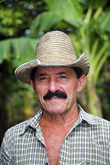 CUBA, Holguin Province, Boca Sama, Farmer near Guardalavaca.