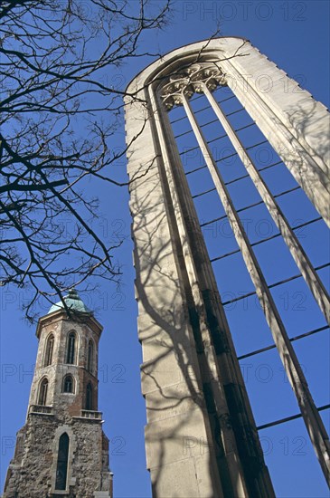 HUNGARY, Budapest, "Castle Hill District, Uri Utca, Mary Magdalene Church Tower, gothic window in foreground,."