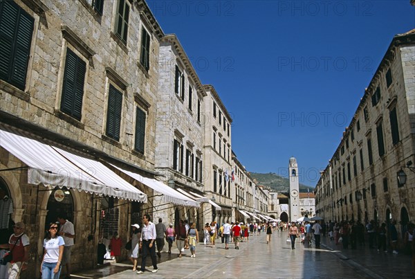 CROATIA, Dalmatian Coast, Dubrovnik, Looking along Stradun to Bell tower (Gradski Zvonik). Former Yugoslavia