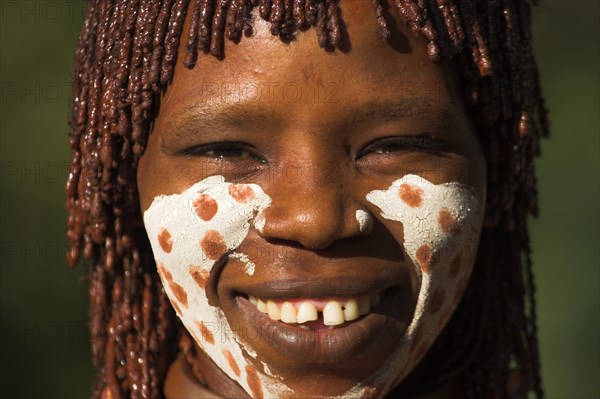 ETHIOPIA, Lower Omo Valley, Mago National Park, "Banna woman, her hair greased with ocher colouring and animal fat into plaits known as Goscha "