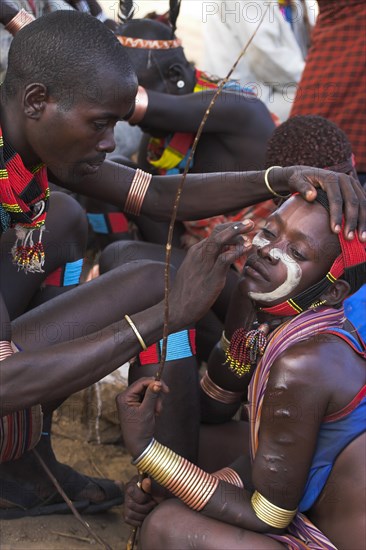 ETHIOPIA, Lower Omo Valley, Tumi, "Hama Jumping of the Bulls initiation ceremony, Face painting with a mixture of clay, oils and plant pigments"