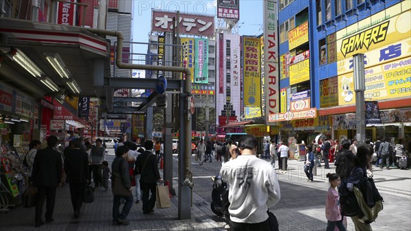 JAPAN, Honshu, Tokyo, "Akihabara ""electric city"", near the train station, crowds, jumble of signs"