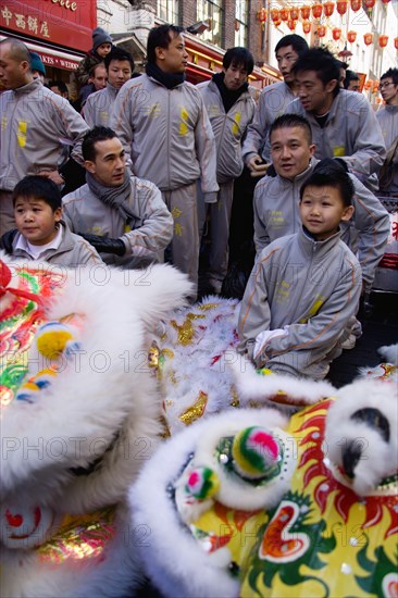 ENGLAND, London, Chinatown, Lion Dance troupe in Gerrard Street with their lions before performing through the area during Chinese New Year celebrations in 2006 for the coming Year of The Dog
