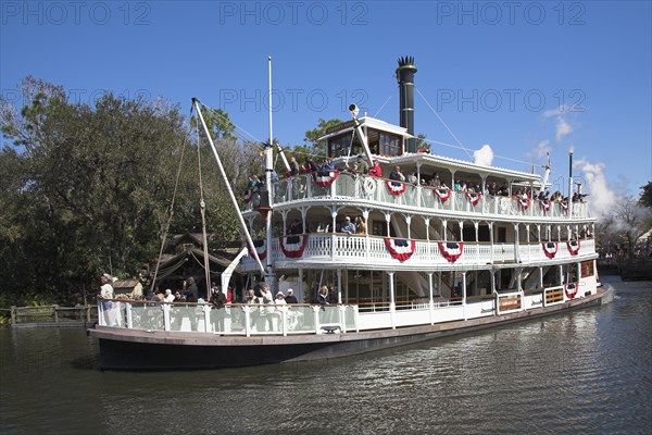 USA, Florida, Orlando, "Walt Disney World Resort. Liberty Belle Paddle Steamer, Liberty Square Riverboat on a lake in the Magic Kingdom."