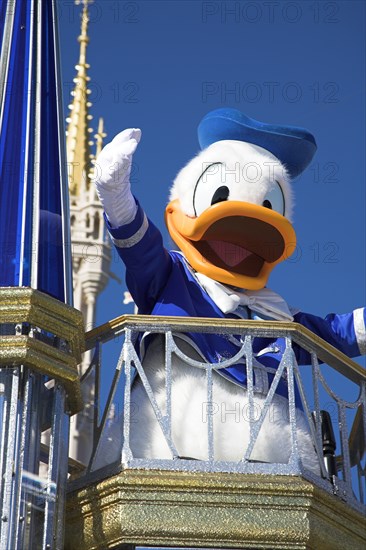 USA, Florida, Orlando, Walt Disney World Resort. Donald Duck character during the Disney Dreams Come True parade in the Magic Kingdom.