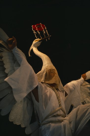 JAPAN, Honshu, Kyoto, "Gion District, Yasaka Shrine.  Performance of the Dance of the White Herons believed to have originated in the ninth century as a feature of Shinto rituals to rid Kyoto of disease, remains part of the festival activities to this day."