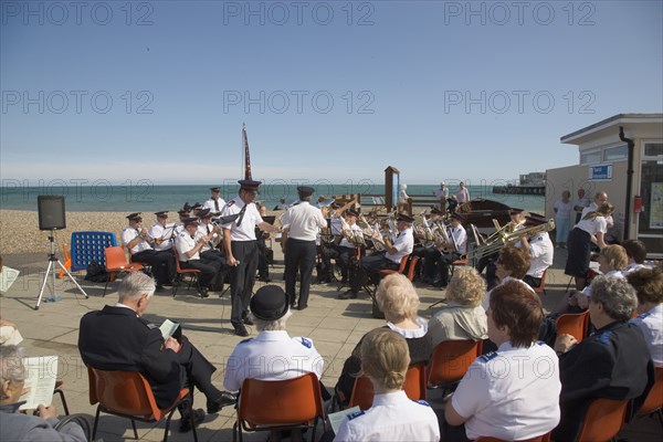 ENGLAND, West Sussex, Worthing, The Salvation Army band playing on the seafront