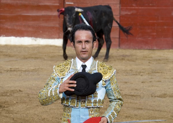 MEXICO, Jalisco, Puerto Vallarta, Bullfight. A matador salutes the presiding dignitary before the tercio de muerte