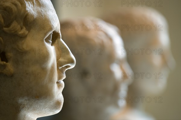 ITALY, Lazio, Rome, Capitoline Museum in Palazzo dei Conservatori. This marble bust found near the Auditorium closely resemble the portrait of the Greek dramatist Menander by the sons of Praxiteles. One of three marble busts displayed in a row