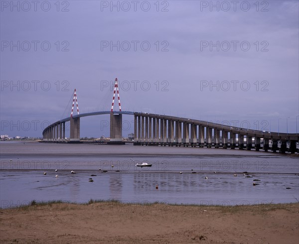 FRANCE, Pays de la Loire, Loire-Atlantique, St Nazaire.  Road bridge over the mouth of the River Loire from south of the village of Mindin.