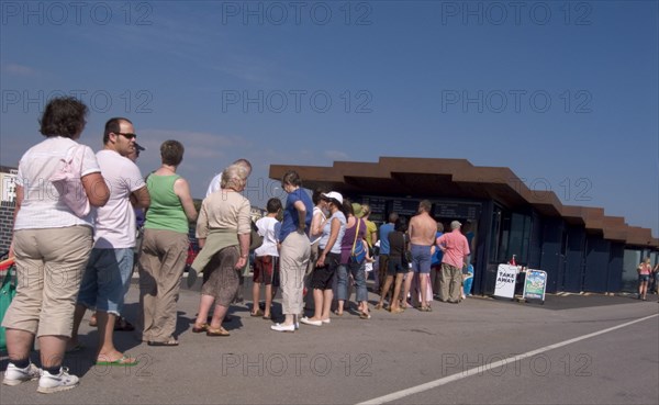 ENGLAND, West Sussex, Littlehampton, Customers queuing at the East Beach Cafe designed by Thomas Heatherwick