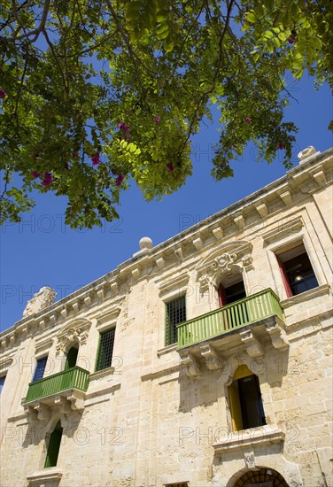 MALTA, Valletta, The waterfront redevelopment of old Baroque Pinto wharehouses below the bastion walls of Floriana beside the cruise ship terminal