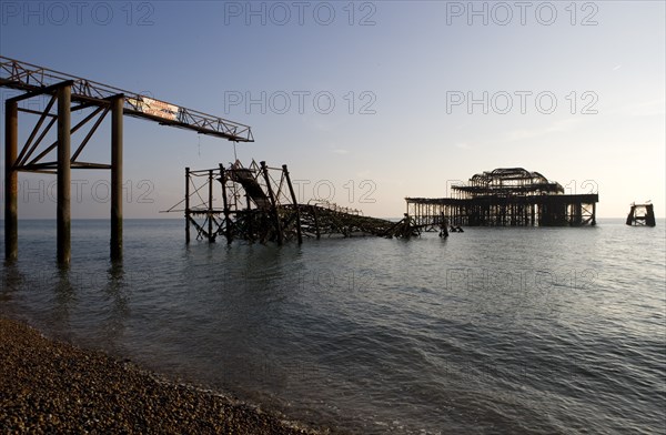 ENGLAND, East Sussex, Brighton, Remains of West Pier after fire destroyed the structure.