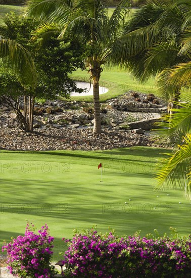 WEST INDIES, St Vincent & The Grenadines, Canouan, Raffles Resort Trump International Golf Course designed by Jim Fazio. The practice green