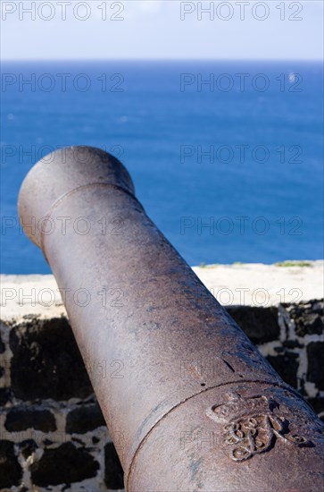 WEST INDIES, St Lucia, Gros Islet , Pigeon Island National Historic Park Cannon at Fort Rodney pointing out to sea