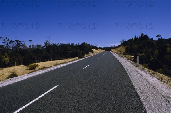 AUSTRALIA, Tasmania, Transport, Deserted tarmac road in the countryside.
