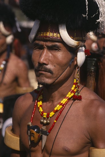 INDIA, Rajasthan, Jaipur, Portrait of a male tribal dancer from Nagaland at the Jaipur Heritage Festival