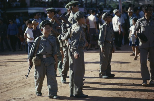 VIETNAM, War, "Pathet Lao child soldiers in Vientiane. Closely associated with the Vietnamese Communist Movement, Pathet Lao became increasingly involved in the conflict with the US"