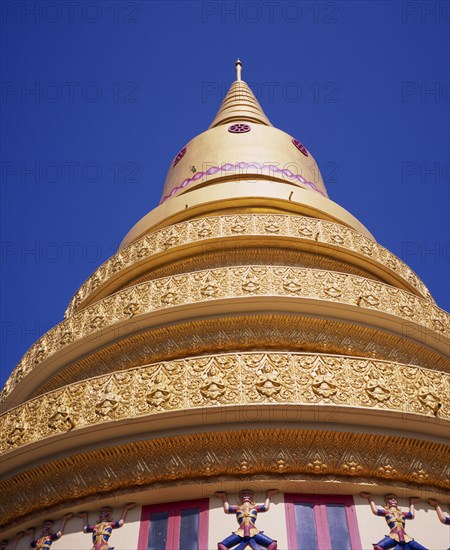 MALAYSIA, Penang, Georgetown, Wat Chayamangkalaram also known as Wat Buppharam. Large Thai temple carved and decorated gold chedi.