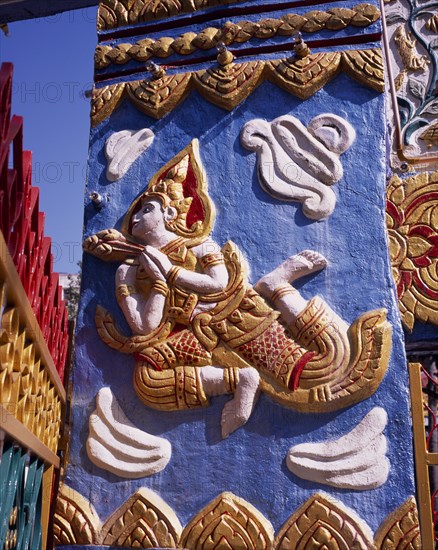 MALAYSIA, Penang, Georgetown, "Wat Chayamangkalaram also known as Wat Buppharam,  large Thai temple.  Detail of carving depicting Sita figure from the Ramakien Thai National epic."