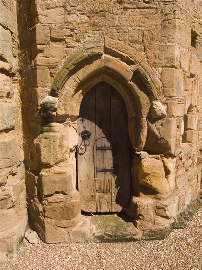 ENGLAND, East Sussex, Battle, Battle Abbey. Detail of wooden gate