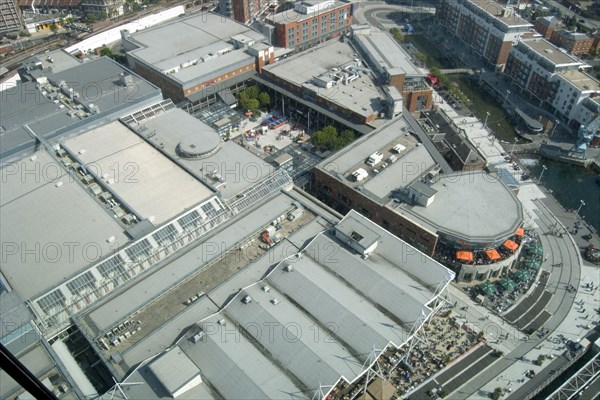 ENGLAND, Hampshire, Portsmouth, Gunwharf Quays. The Spinnaker Tower. Aerial view from observation deck over the rooftops of the whole shopping and restaurant complex