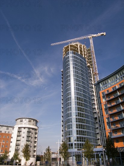 ENGLAND, Hampshire, Portsmouth, Gunwharf Quays complex. A development of tall modern apartments in process of being built