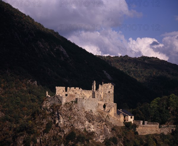 FRANCE, Midi-Pyrenees, Ariege, "Chateau d’Usson.  Ruined castle dating from the eleventh century, one of the last strongholds of the beseiged Cathars.  Set in rocky mountain landscape."