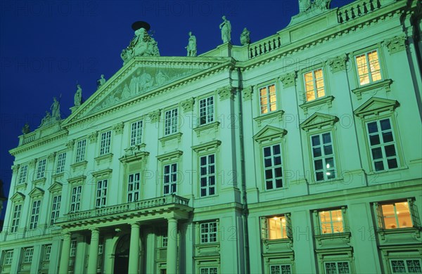 SLOVAKIA, Bratislava, Angled view of exterior facade of the Primacialny or Primate’s Palace at night. Neo-classical palace in the Old Town built 1778-1781 for Archbishop Jozsef Batthyany.