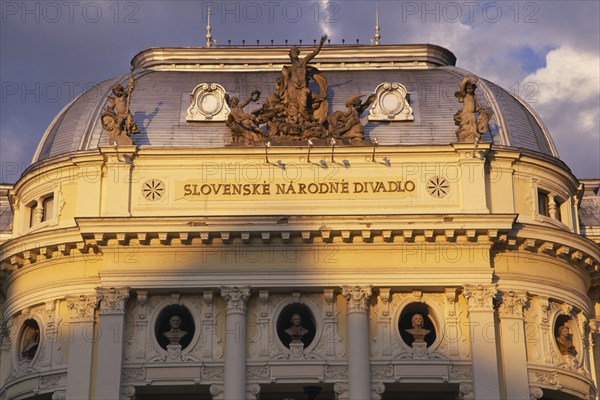SLOVAKIA, Bratislava, "Slovenske Narodne Divadlo, the Slovak National Theatre.  Detail of facade with statues and carvings in Neo-Classical style, built 1885-1886."